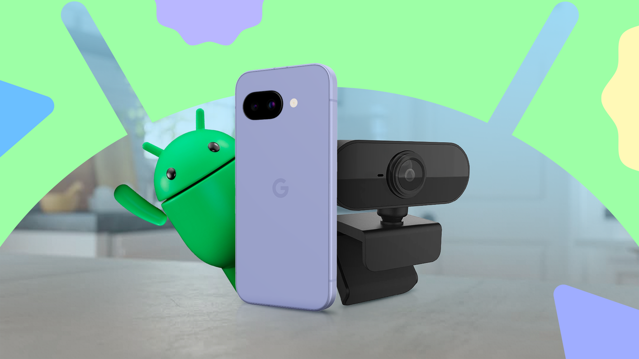 ウェブカメラの隣に置かれた Google Pixel スマートフォンの後ろから、カラフルな抽象的な形を背景に Android マスコットが覗いています。