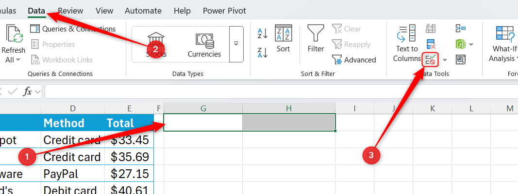 Excel シートのセル G1 と H1 が選択され、[データ検証]ボタンが強調表示されます。