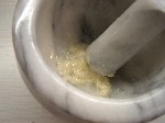 crushing garlic