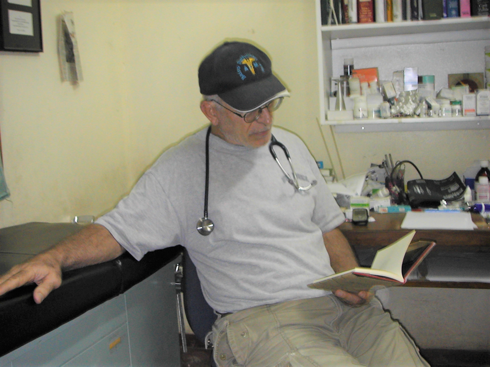#4 Dan at ease reading Japanese Zen book after a busy consultation 2007