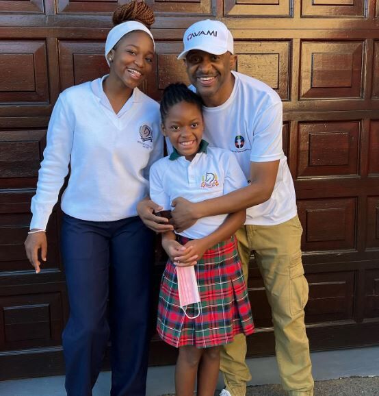 Arthur Mafokate with his daughters