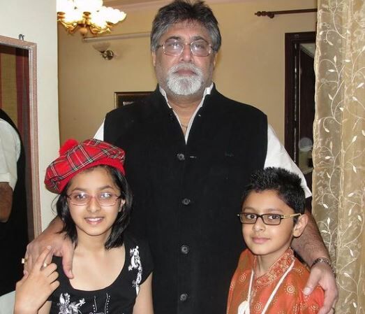 Childhood photo of Vibhu with his father and sister