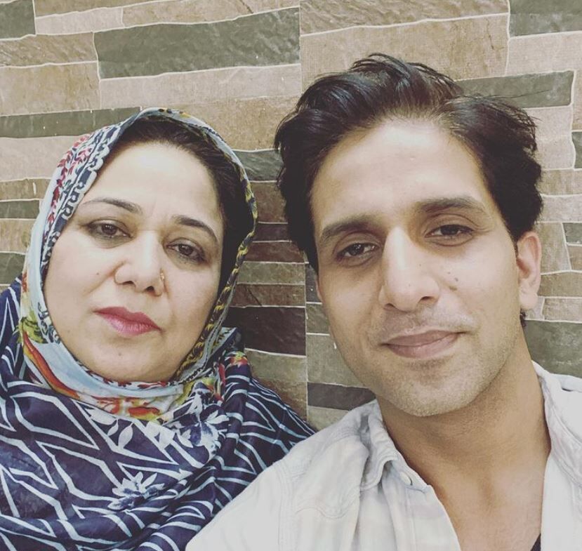 Arslan Goni and his mother