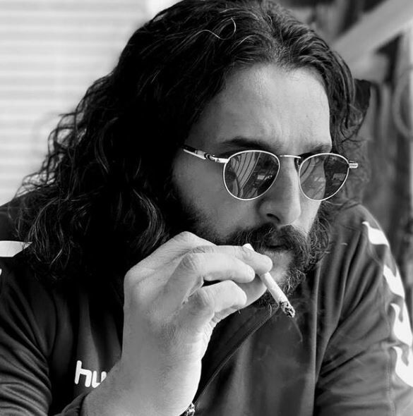 Jiya Irani smokes
