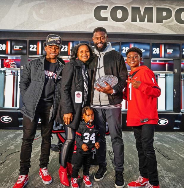 Jahmile Addae with his wife and kids