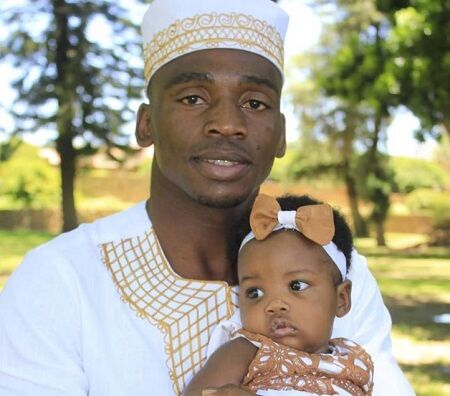 Jeremiah Nakathila with his daughter