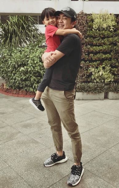 Xian Gaza with his son