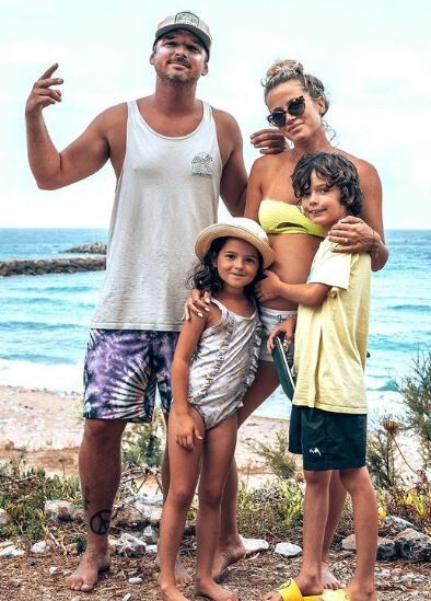 Marko Grilc with his fiancée and kids