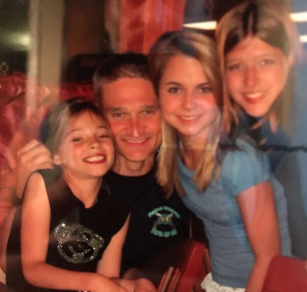 Christy Giles old image with her father and sisters