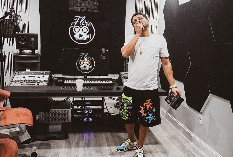 Flow La Movie in his recording studio