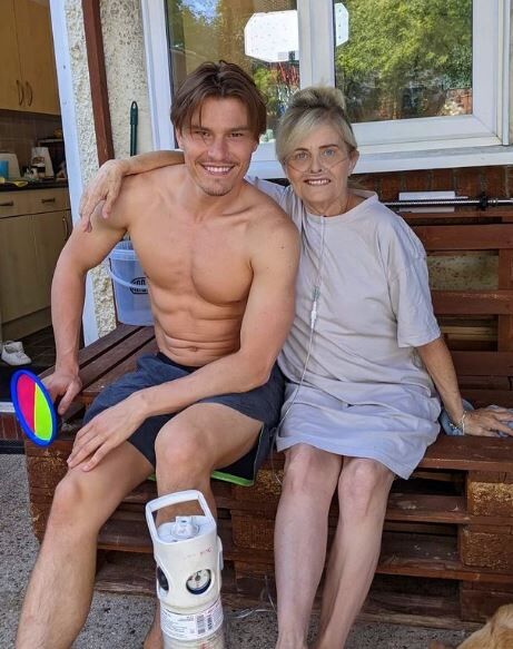 Oliver Cheshire with his mother
