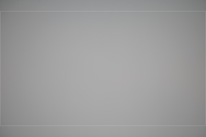 11437