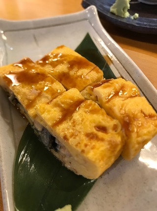 う巻