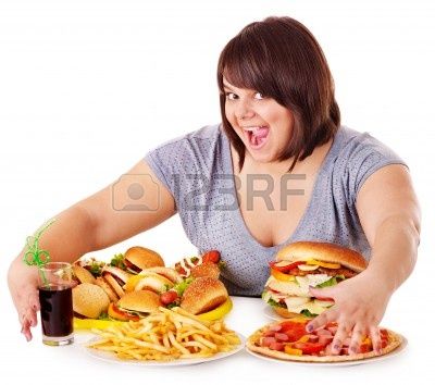 13852019-overweight-woman-eating-fast-food
