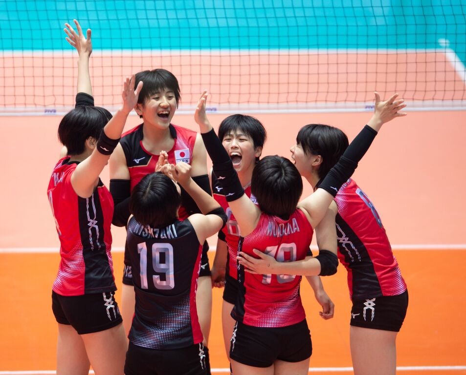 JapanteamcelebrateduringthematchagainstUSA