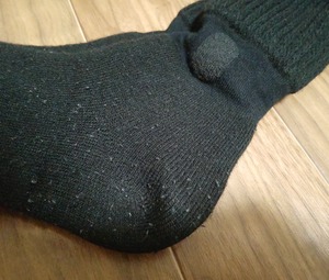 まるでこたつソックスの毛玉の写真