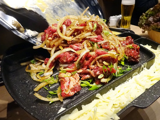 「手巻き焼肉 金の牛」
