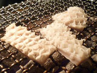 「萬野屋」