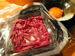 「炭火焼肉たむら」
