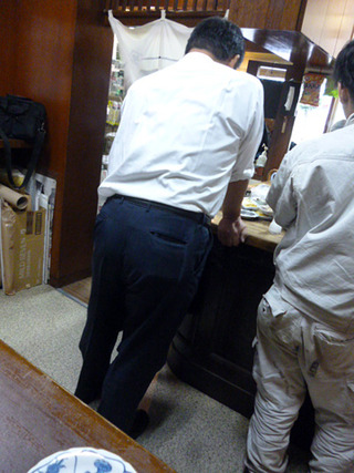 「飯田酒店」
