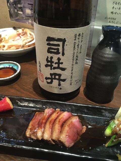 写真11 「米から育てた純米酒」と「鴨ロース」