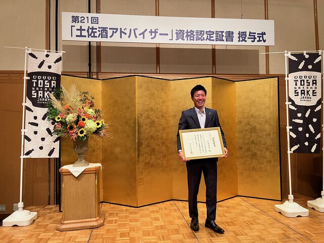 写真10 竹内社長記念撮影