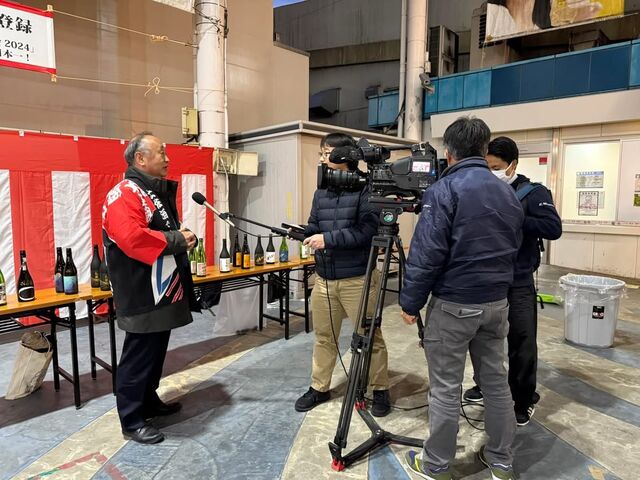 写真10 竹村取材