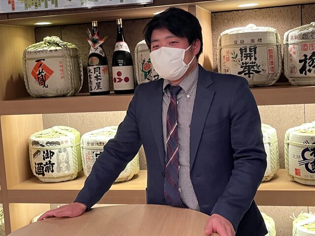 写真9 岡本屋永吉商店にて