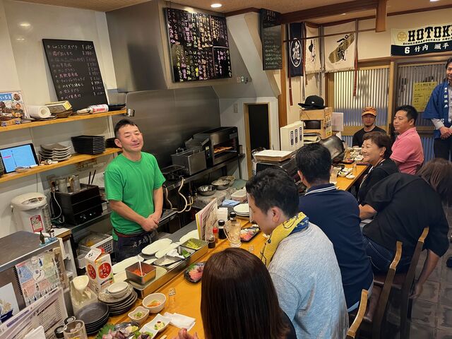 写真6 店主越山さん