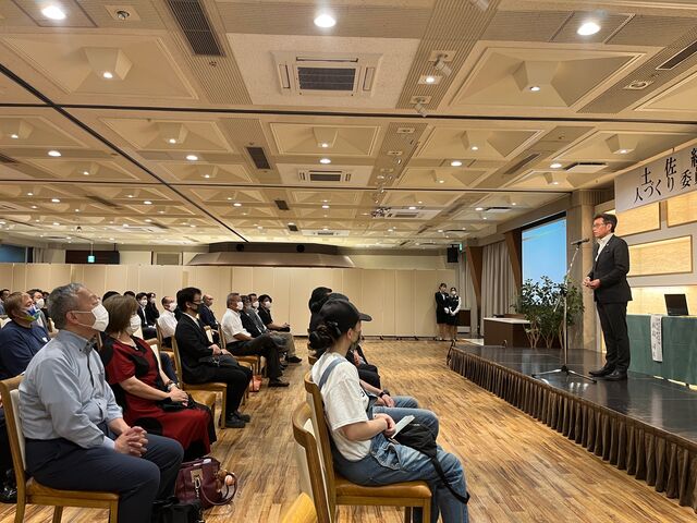 写真3 佐竹代表幹事開会挨拶
