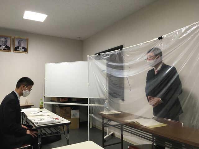 写真2 倉光鑑定官室長