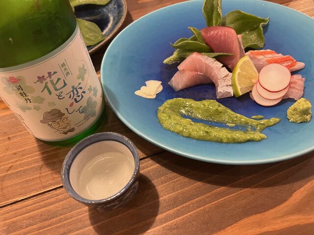 写真5 刺身盛りと花と恋して