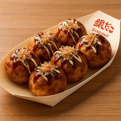 銀だこを88円で食べるために並んでる