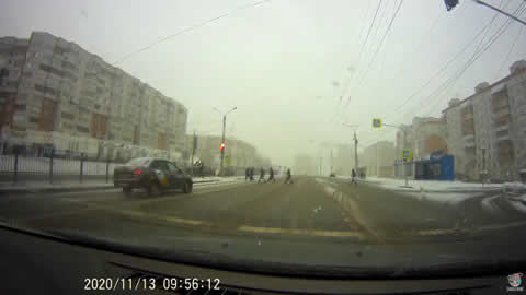 Speeding Taxi Miraculously Misses Pedestrians
