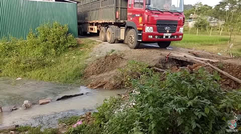 Outcome of Cargo Truck Supported by Two Wooden Boards