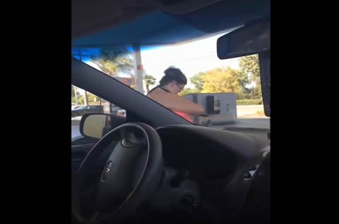 Woman Washing Herself with Car Window Wiper