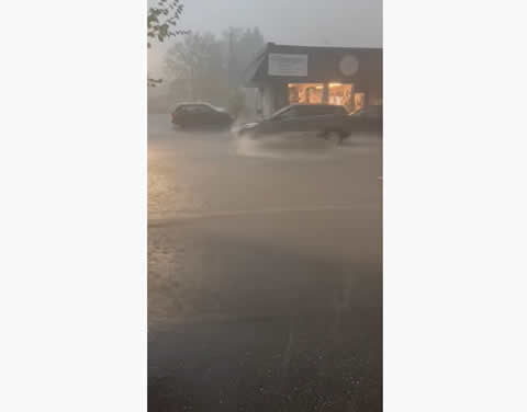 Inflatable Doll Floats by in Flash Flood