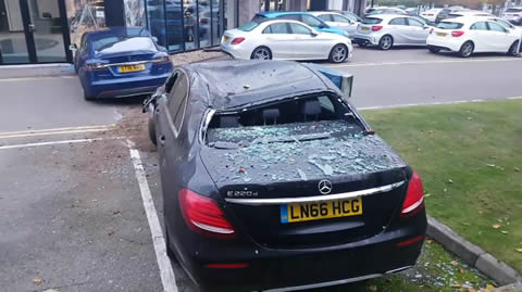 Tesla crashes into Mercedes-Benz dealership