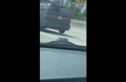 Back Tire Bounces Along Expressway