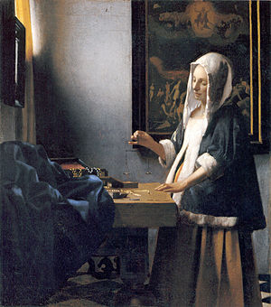 300px-Woman-with-a-balance-by-Vermeer