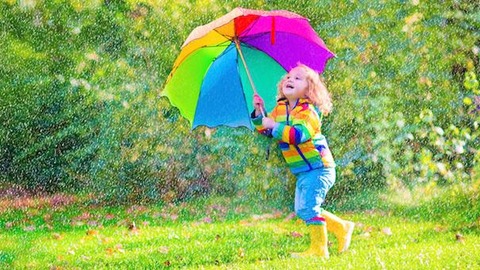 happy-little-girl-rain-umbrella-Dollarphotoclub_70683964