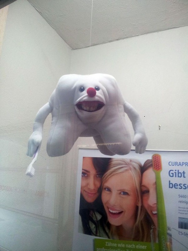 creepy-educational-dentist-toys-5cc69aee03f9f__700