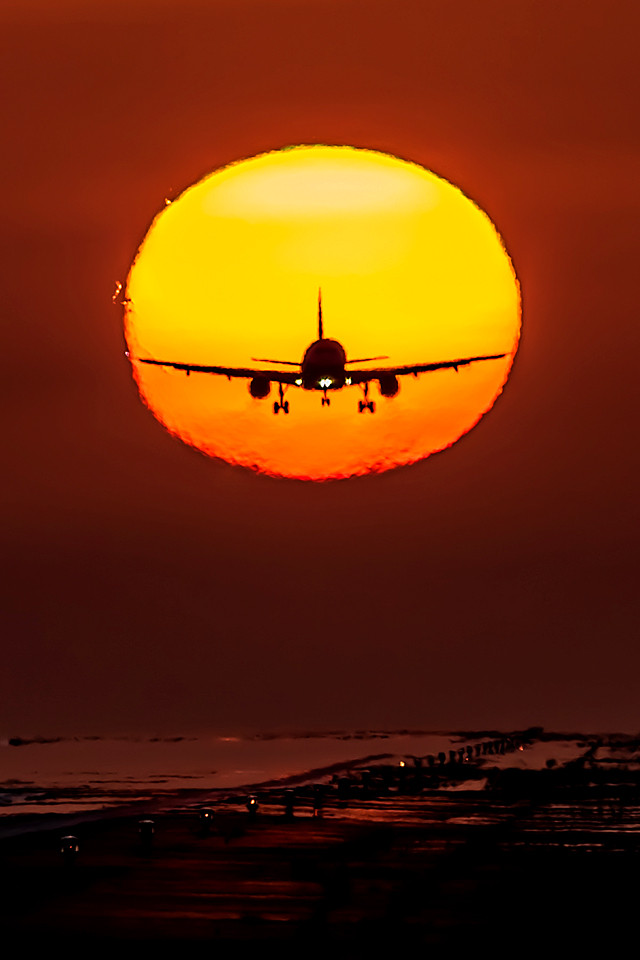 夕陽とヒコーキ