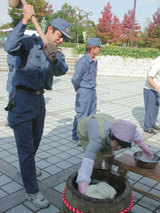 防火餅つき