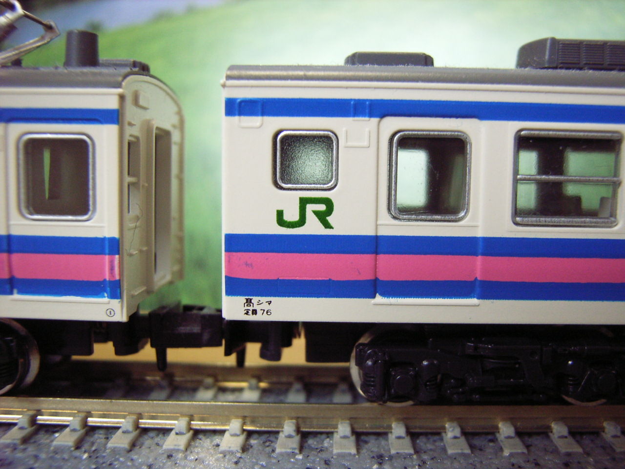 165系 快速 くじらなみ 号 モントレー色 波浪規定の部屋