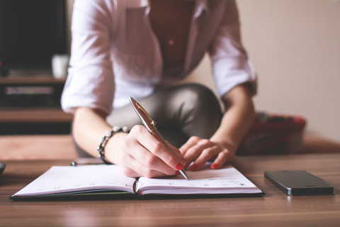 girl-writing-in-a-diary-picjumbo-com