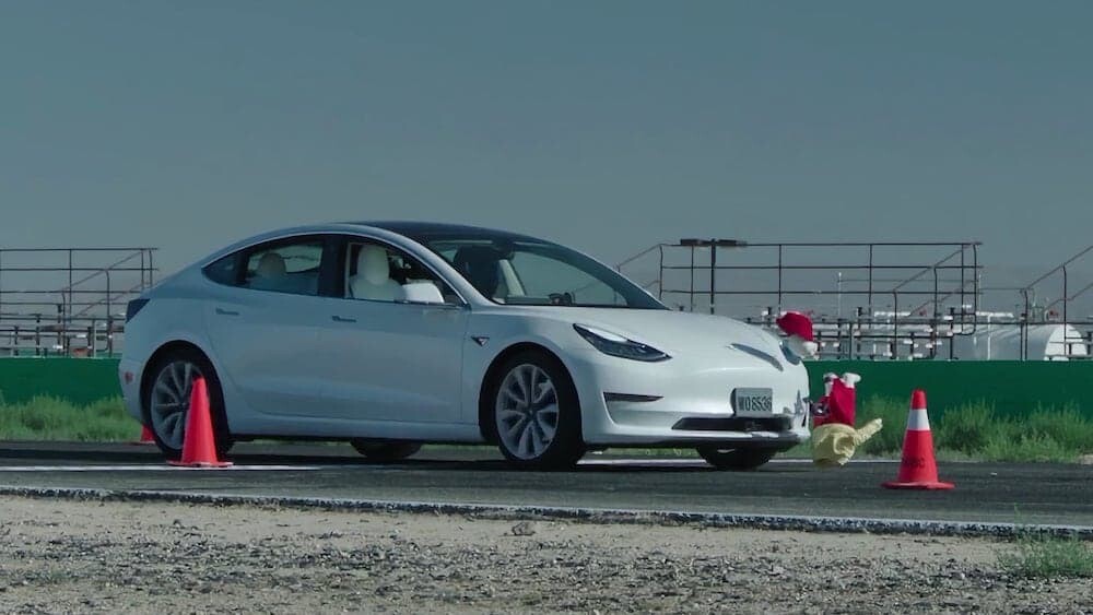 テスラ イーロン・マスク 完全自動運転 FSD オマール・カージ
