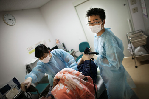 Messy screaming asian doctor