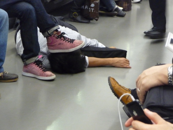 sleeping-salaryman-on-train-floor
