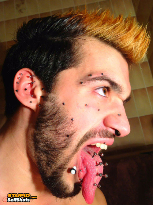 WAY-too-many-face-piercings-self-shot-500x672